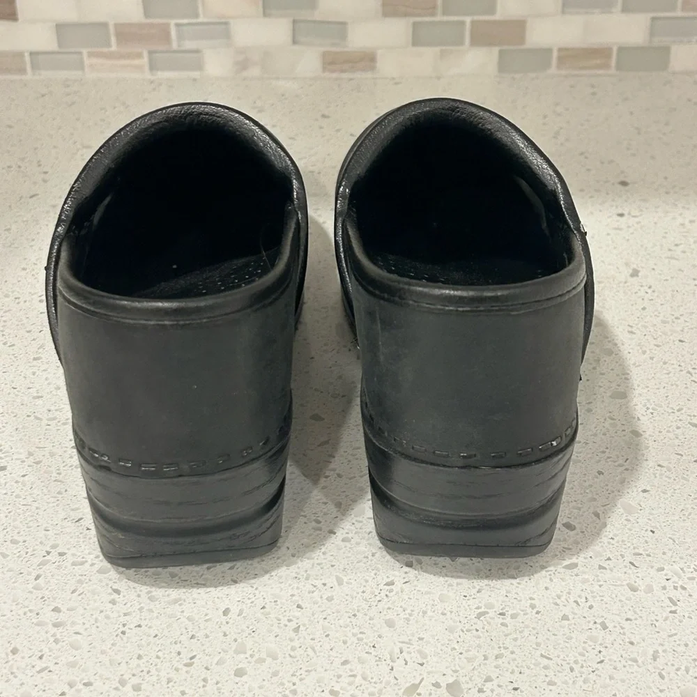 Dansko Matte Black Slip-On Clogs - Picture 3 of 4